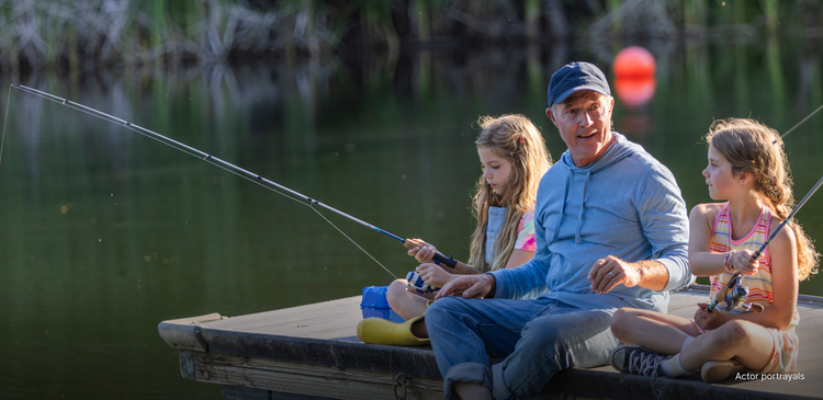 Actor portrayal of a grandfather fishing with his granddaughters