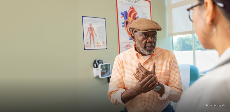 Actor portrayal of an older adult visiting the doctor