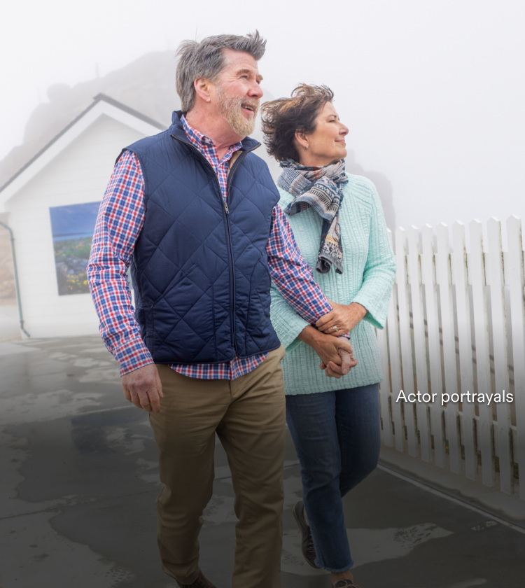 Actor portrayal of an older couple outdoors