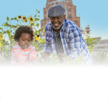 Actor portrayal of a grandfather gardening with his 