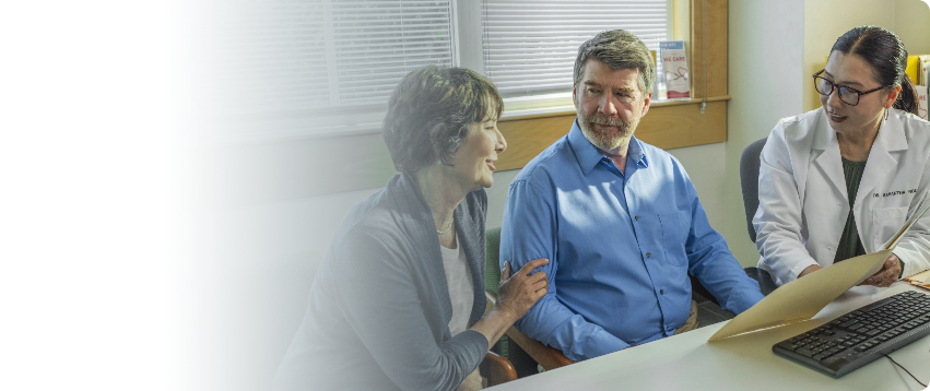 Actor portrayal of a doctor discussing with her patients