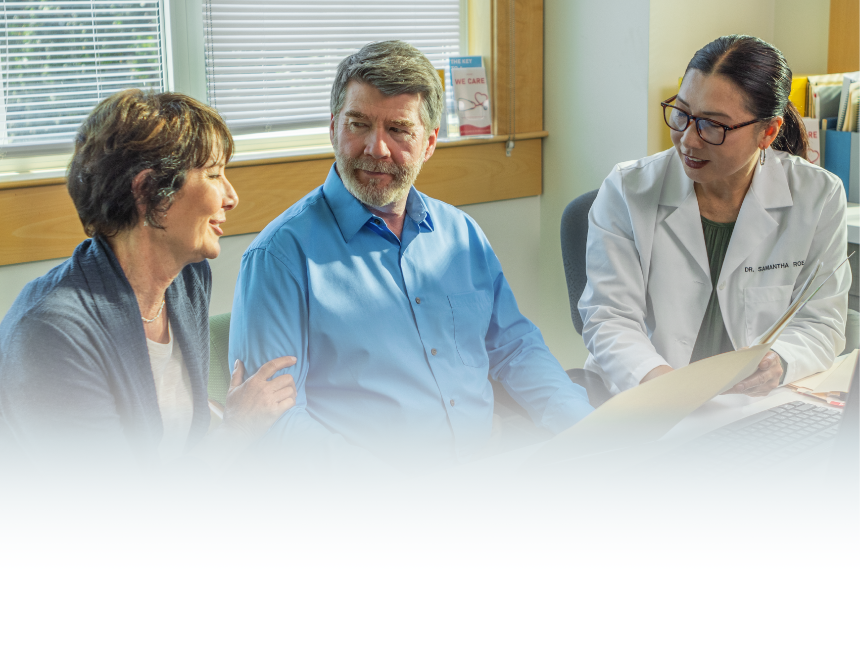 Actor portrayal of a doctor discussing with her patients