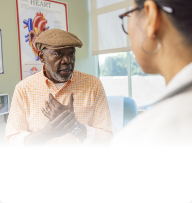 Actor portrayal of an older adult visiting the doctor